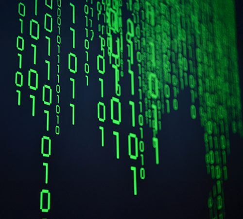 Green binary code cascading on a dark screen, symbolizing data encryption, digital security, and metadata protection.